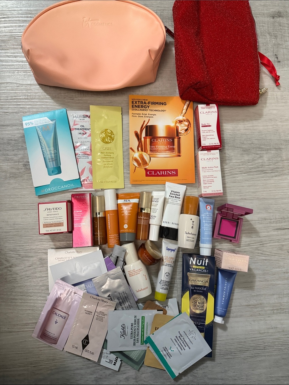 Variety of Skincare samples + 2 makeup bags